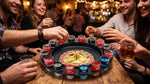 Personas adultas jugando con una ruleta de shots en una reunión